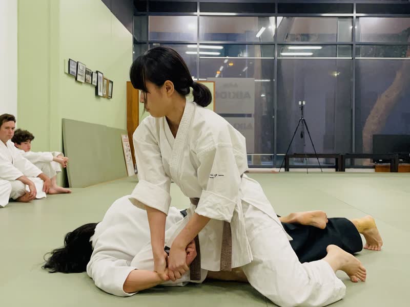 Jennifer Chiu holding a yonkyo pin