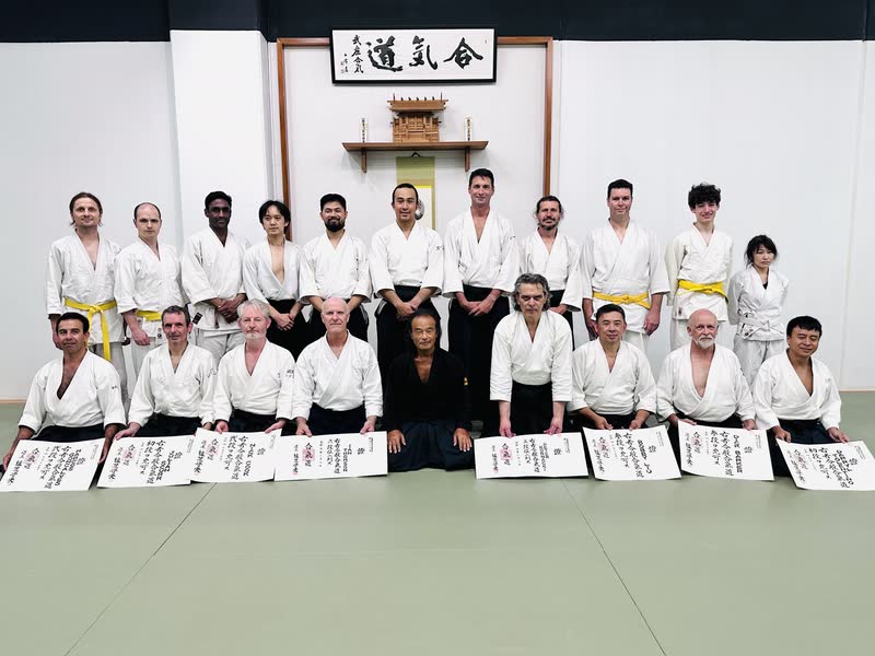 Dan promotions at the North Sydney dojo, certificates laid out on the mat