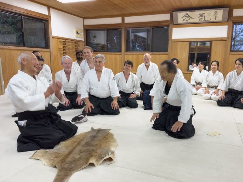 Takayasu Sensei talking with Inagaki Sensei at the Iwama dojo