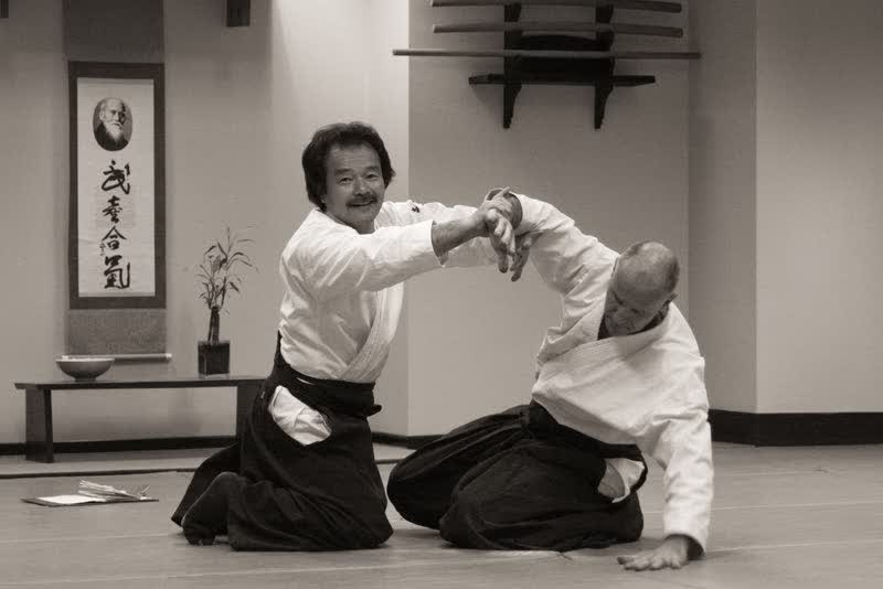 Takayasu Sensei working suwari waza beneath the kamiza