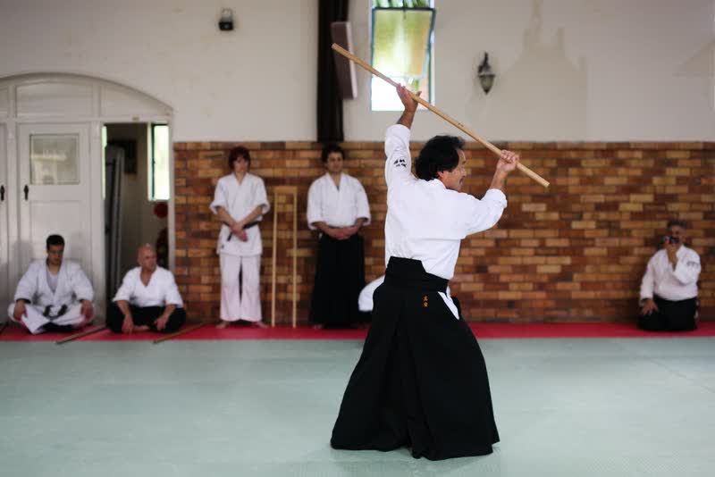 Takayasu Sensei finishing katate gedan gaeshi with the jo at a seminar at the Ku-ring-gai dojo