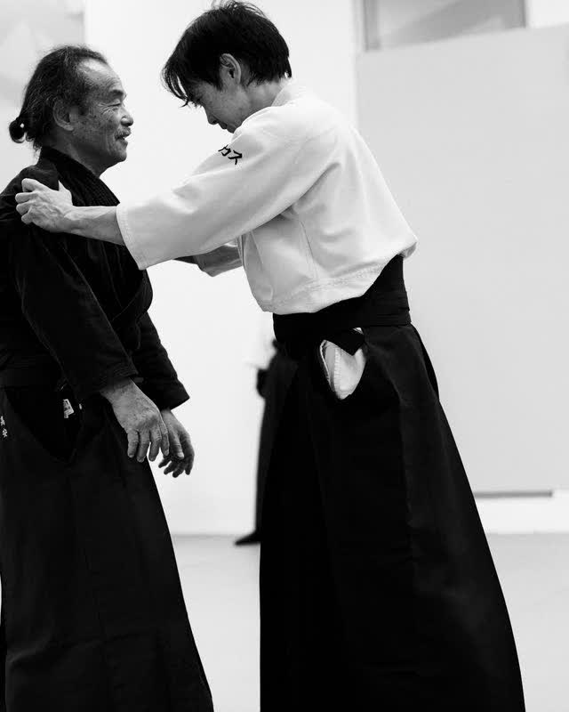 Takayasu Sensei taken by both shoulders, ryokata tori, at the North Sydney dojo. Photograph by Sheree Porter