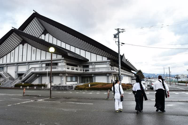 Walking to the Morioka Budokan in hakama on a wet morning