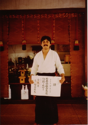 Derek Minus Sensei with Shodan certificate in Iwama