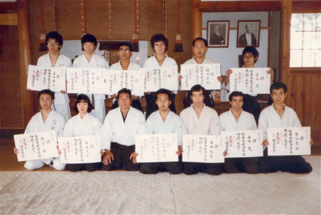 Saito Sensei with black belts, Iwama 1984