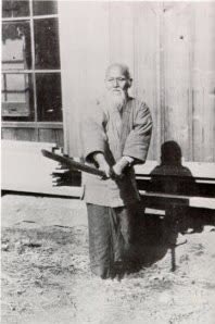 O-Sensei demonstrating sword posture, Iwama