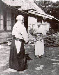 O-Sensei teaching sword in Iwama, with Saito Sensei, 1950&rsquo;s