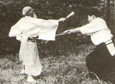 O-Sensei teaching sword in Iwama, with Saito Sensei, 1960&rsquo;s