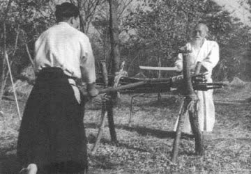O-Sensei teaching sword in Iwama, with Saito Sensei, 1960&rsquo;s