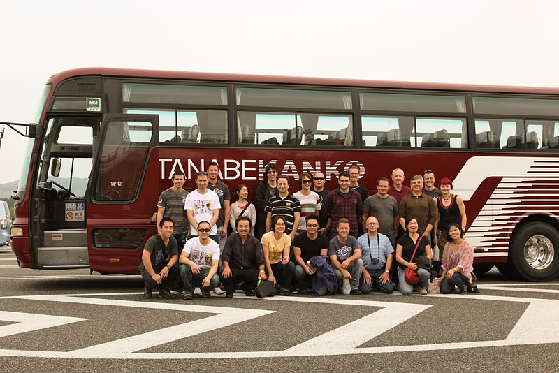 Group photo in front of our chartered bus