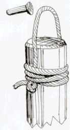 A jo hung on a wall hook by a string loop
